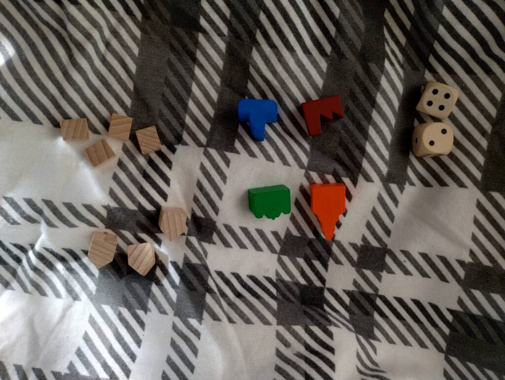 Pionki do gry z planszówki "Włocławscy Milionerzy" Fundacji Ładowarka